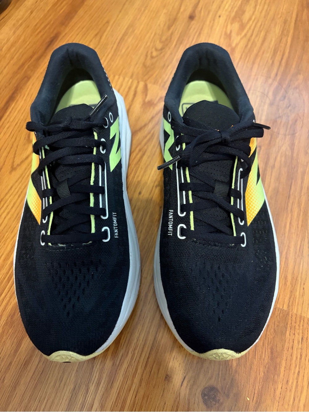 New Balance Black Athletic Sneakers with Yellow-Green Accents